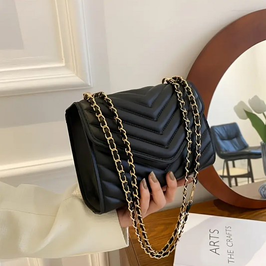 MV - SLY envelope matelassé shoulder bag